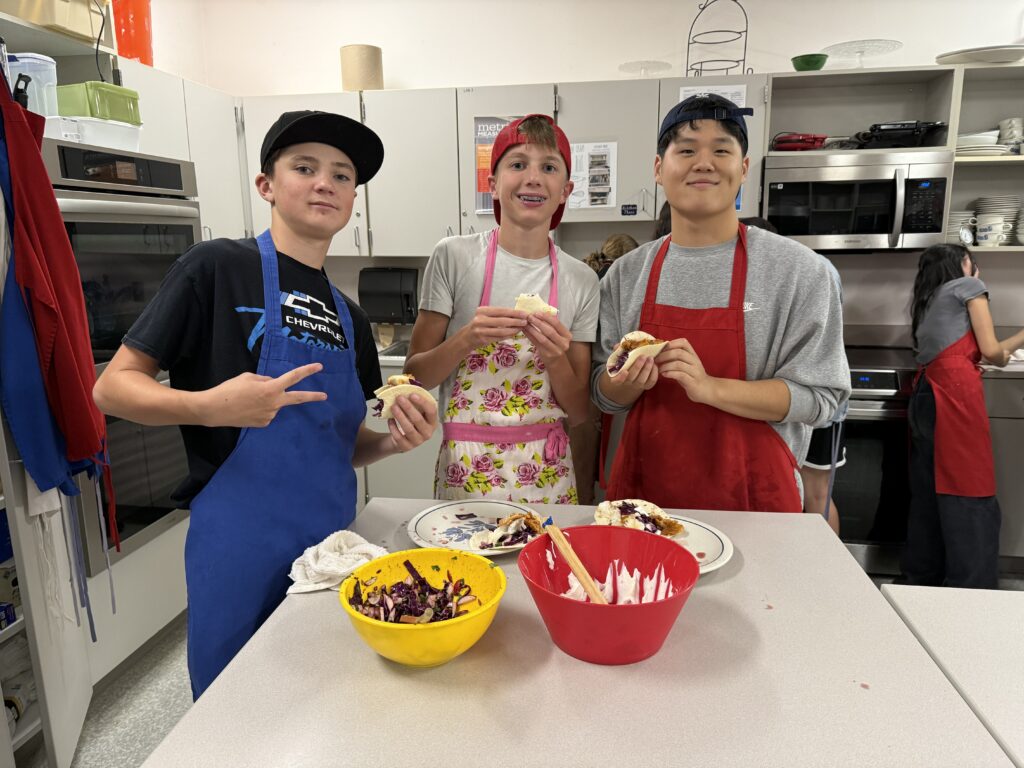 Cooking Club members sample the meal. Yum!